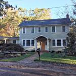 A 100-year old Kenilworth classic home gets a carport and generous contemporary addition on back side