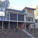 Though the front of the house maintains its traditional face, the back side of this 100 year old Kenilworth classic gets a gorgeous contemporary addition and screen room